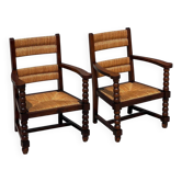 Pair of stained oak and straw armchairs, French work, 1950