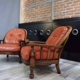 Pair of 60s armchairs in leather and wood