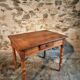 French vintage side table in cherry wood with a drawer.