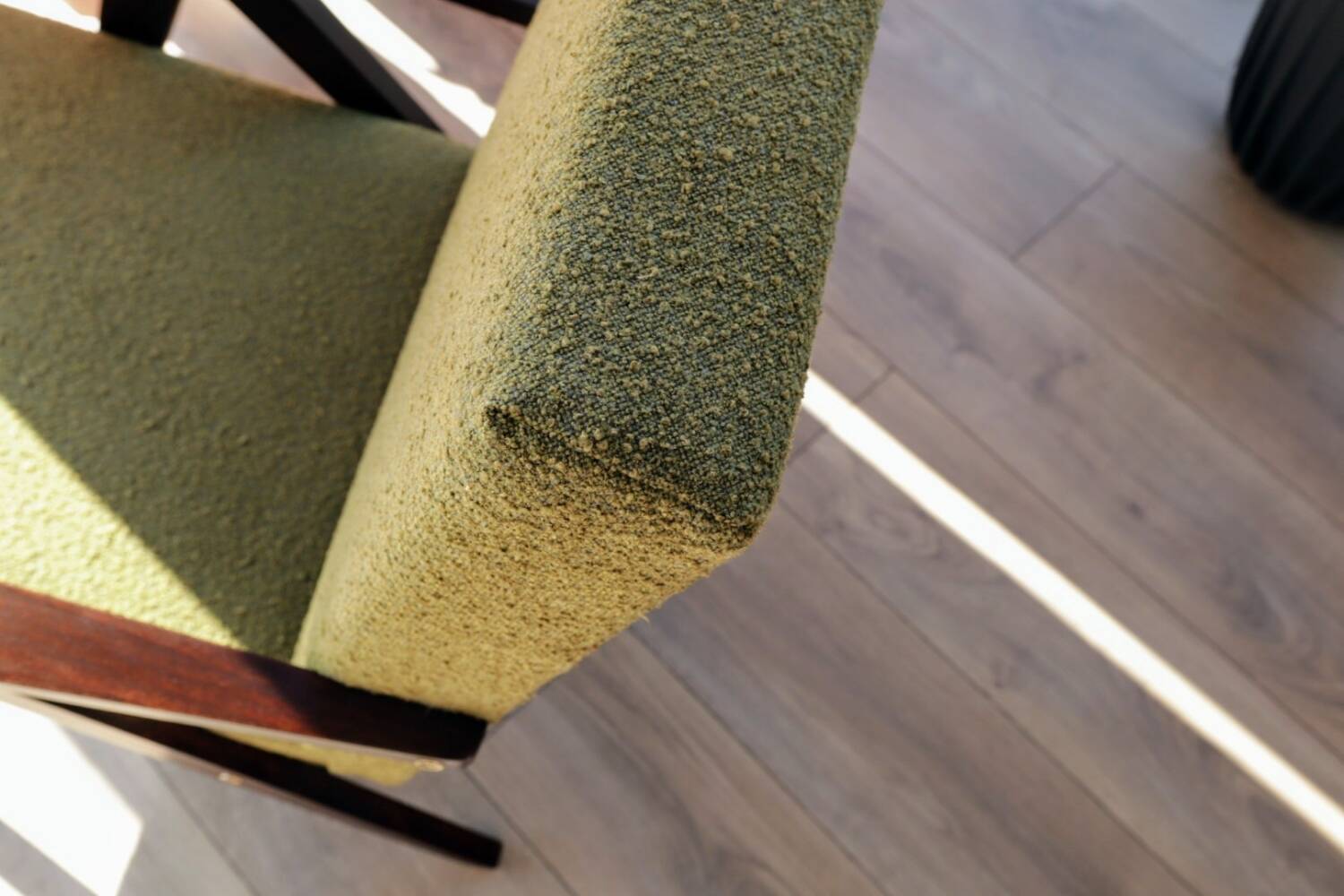 Vintage armchair in moss green bouclé design by H. Lis.