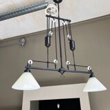 Lustre en fer à deux bras avec des abat-jour en verre opalin. Modèle Athena de Flamant