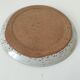 Speckled stoneware plate with floral decoration