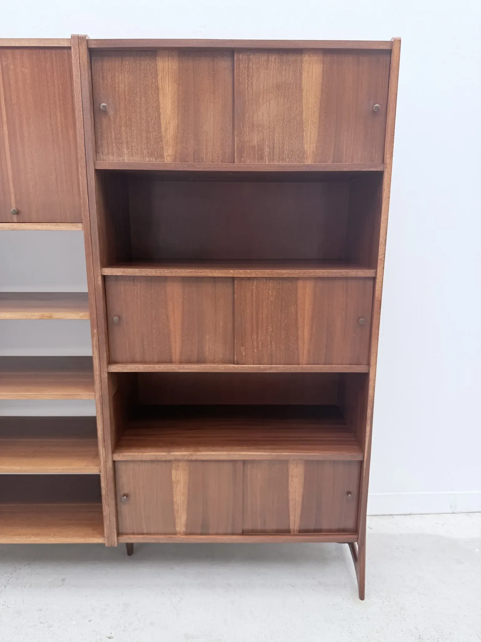 Scandinavian style bookshelf in teak and brass, 1950.
