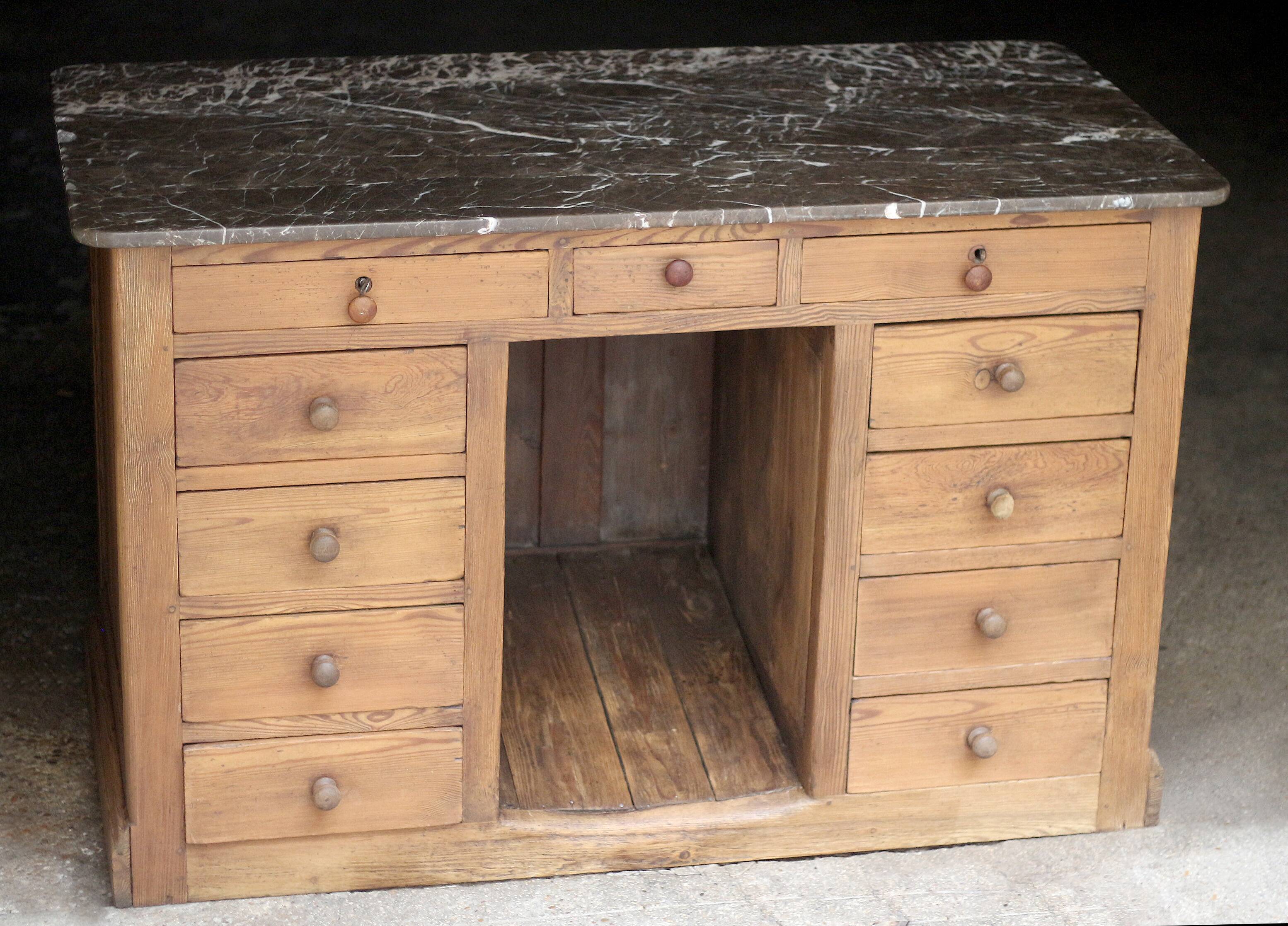 Exceptional pharmacy counter in solid pine and marble (19th century).