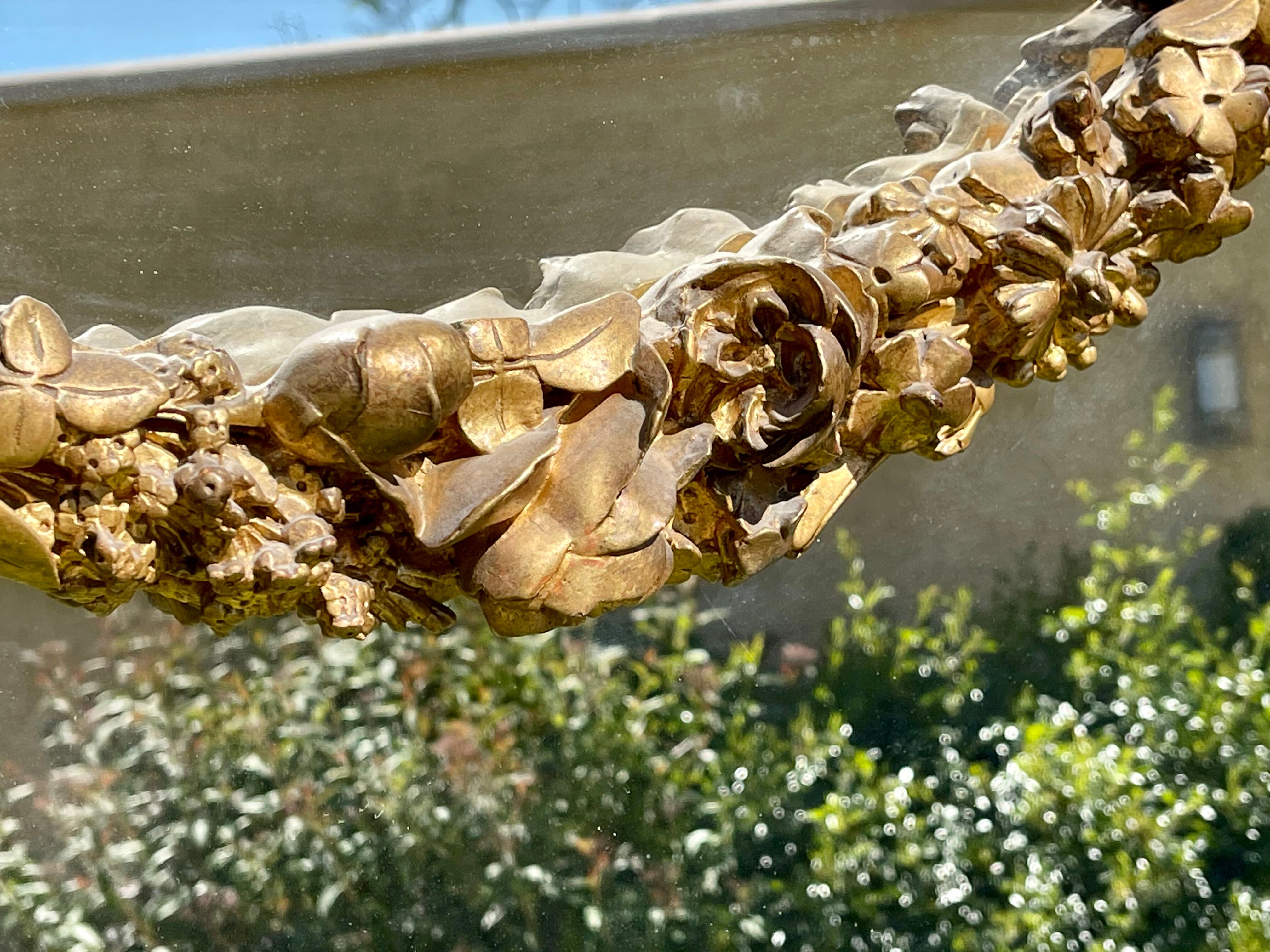 Gilded plaster mirror Louis XVl style