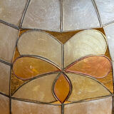 Mother-of-pearl and brass pendant with floral decoration.