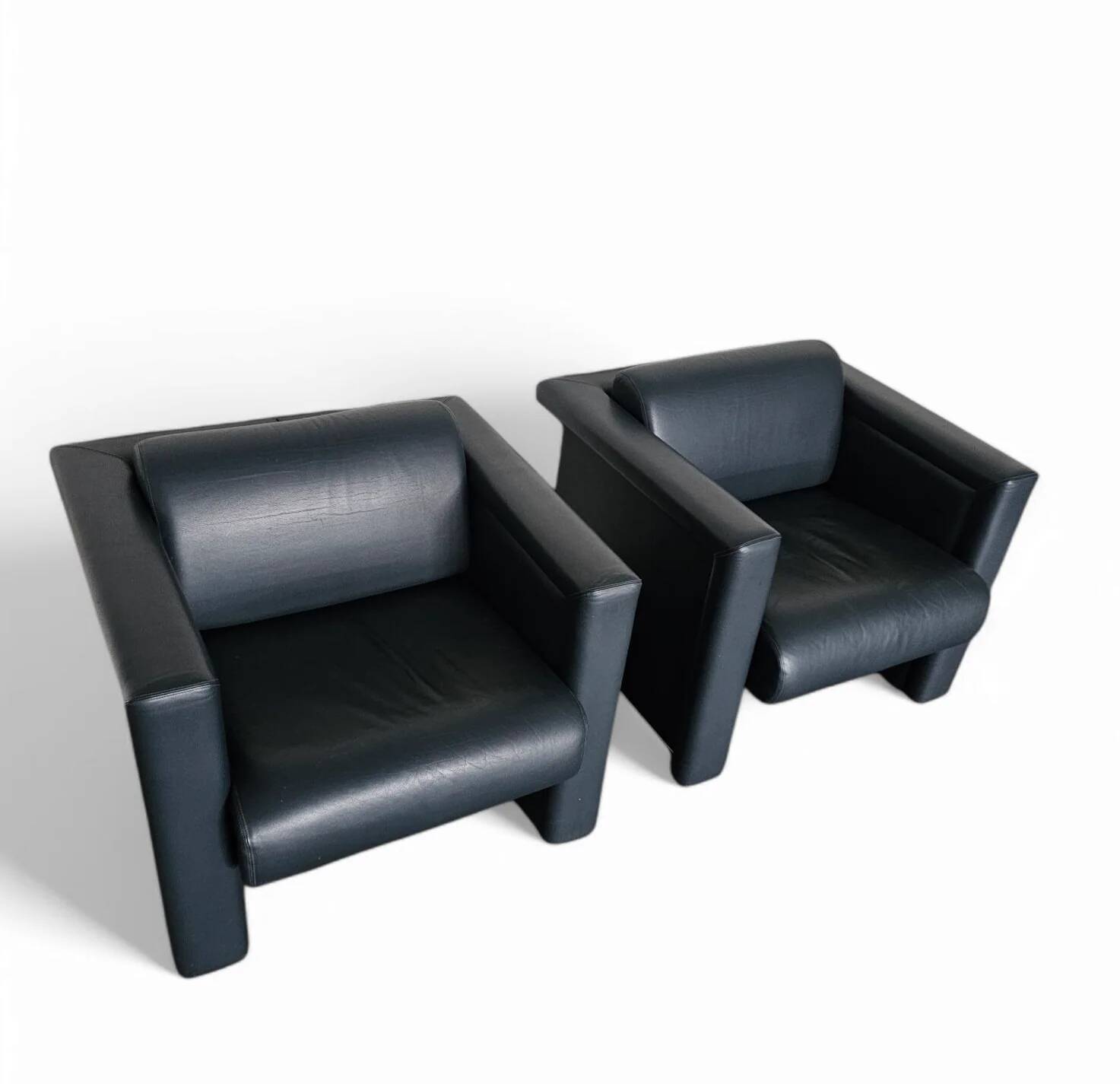 Pair / Trix and Robert Haussmann / Dark grey leather chairs by Knoll