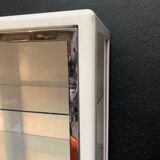 White enamelled metal design showcase. Period 1960