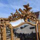 Large closed mirror, 19th century, wood and gilded stucco.