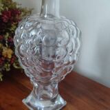 Old carafe in pressed glass grape cluster style