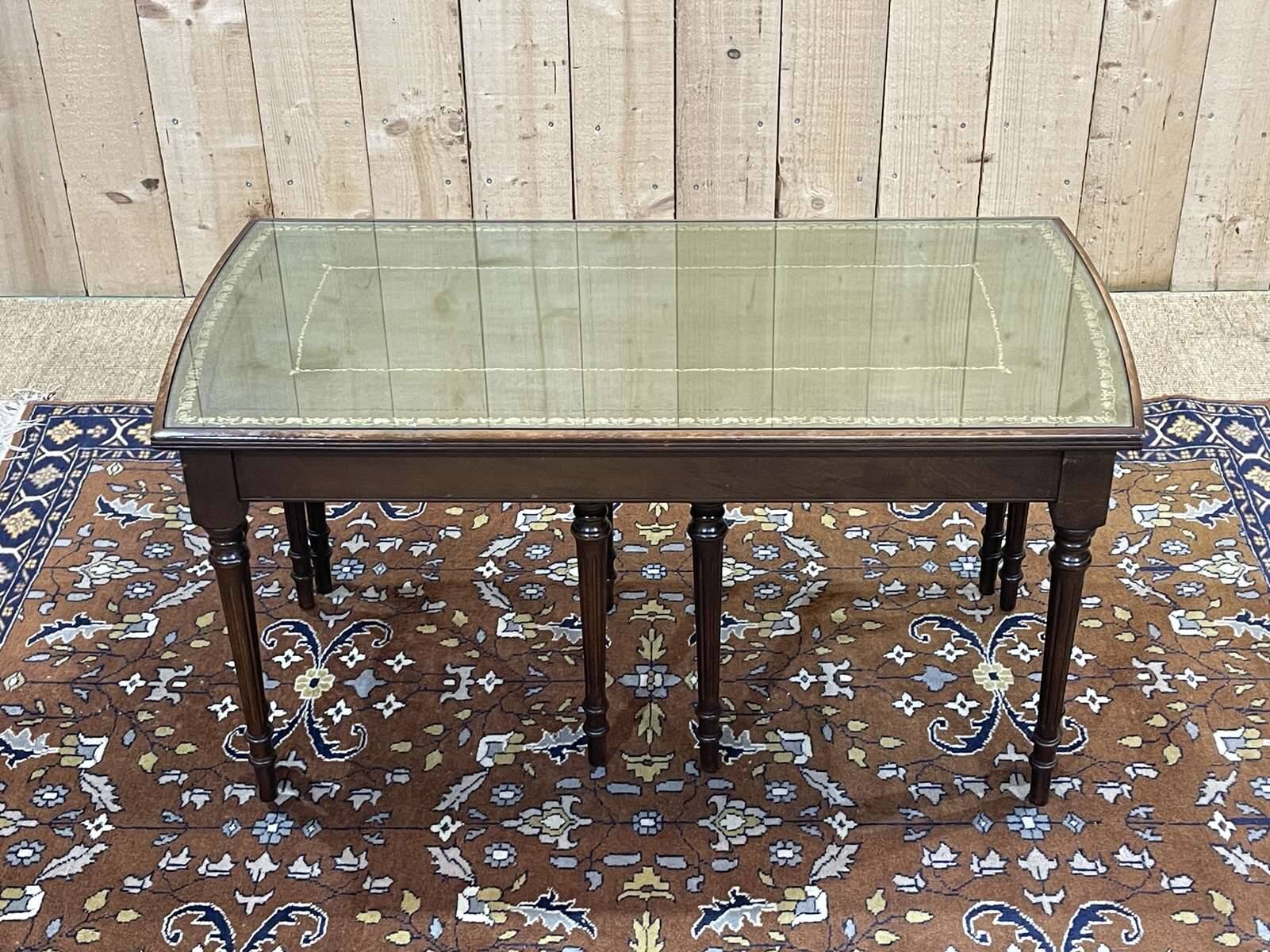 English nesting tables in mahogany and leather top under glass - work from the 1950s