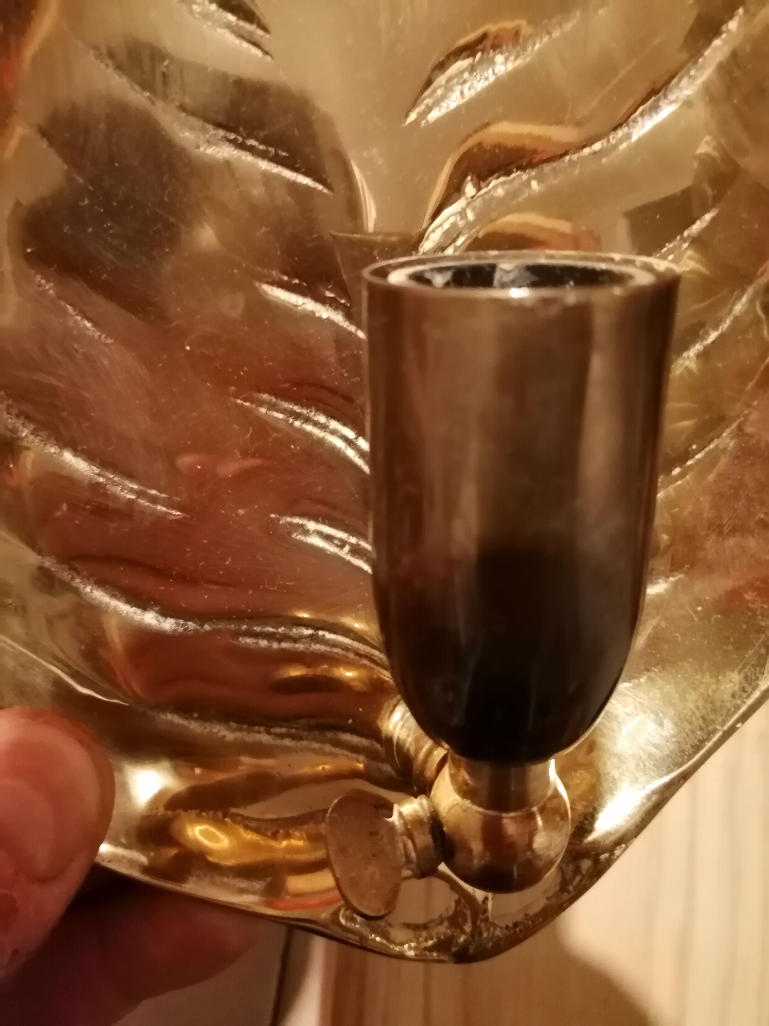 Adjustable bronze wall light with leaf decor