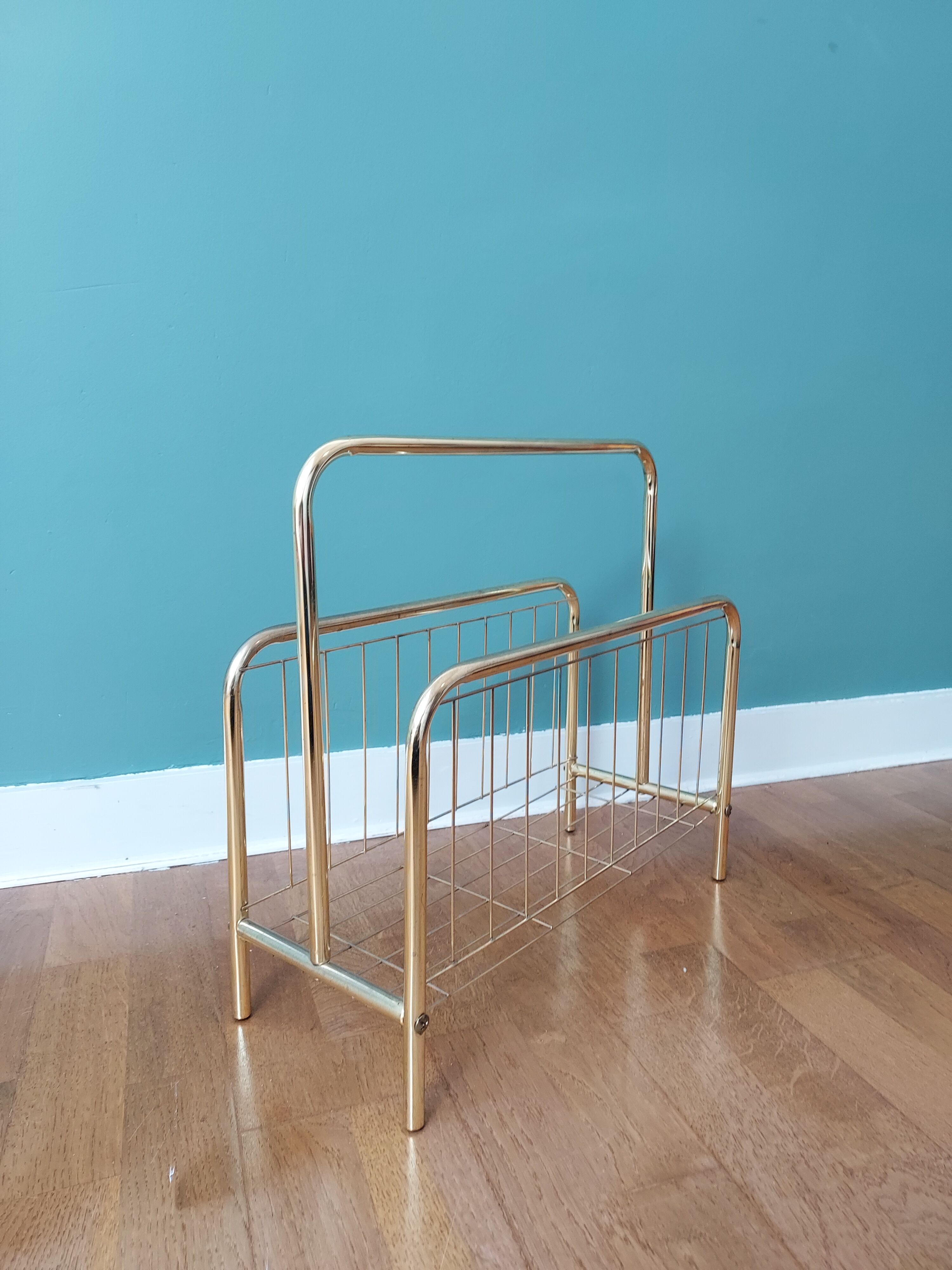 Gilded metal magazine door