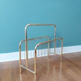 Gilded metal magazine door