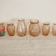 Set of 6 bulb or hyacinth vases in pink molded glass