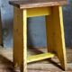 Art-populaire workshop stool in patinated wood