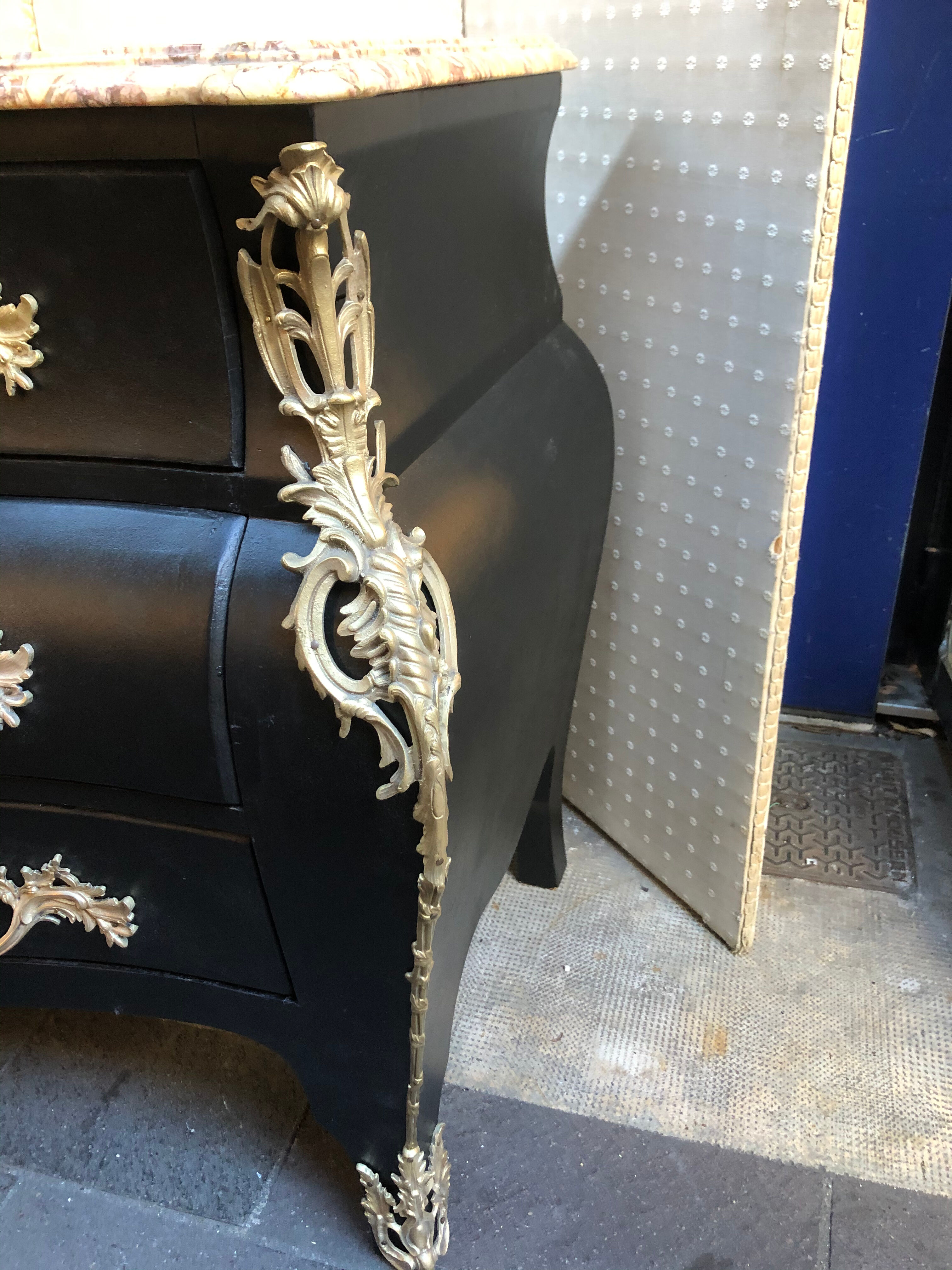 Chest of drawers "tomb" patinated black regency style