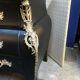 Commode "tombeau" patiné noire style régence