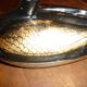 Black and gold wooden duck