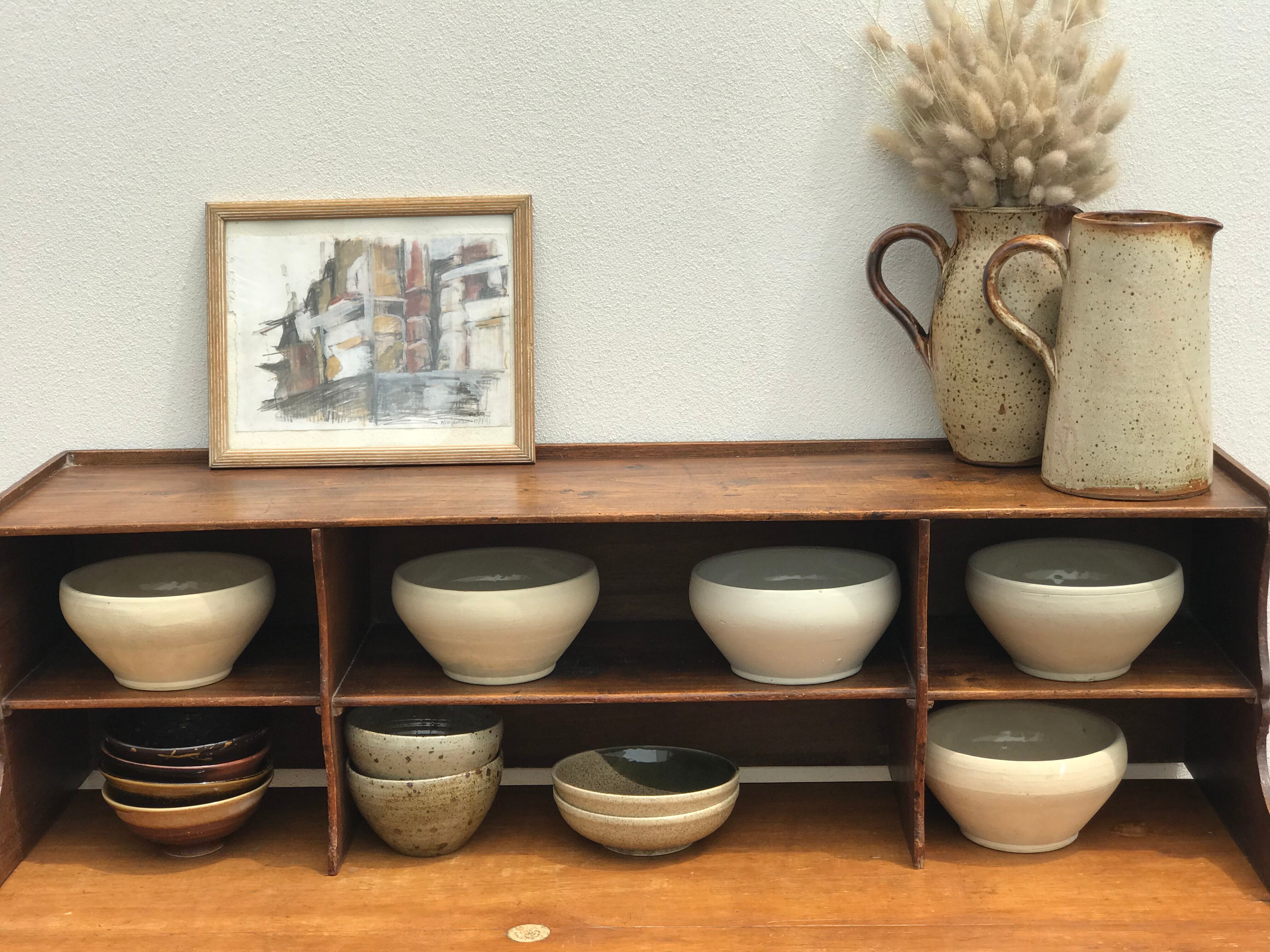 Pair of sandstone pitchers