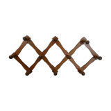 Folding wall coat rack