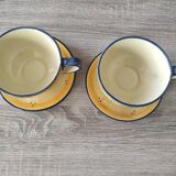 2 hand painted cups and saucers