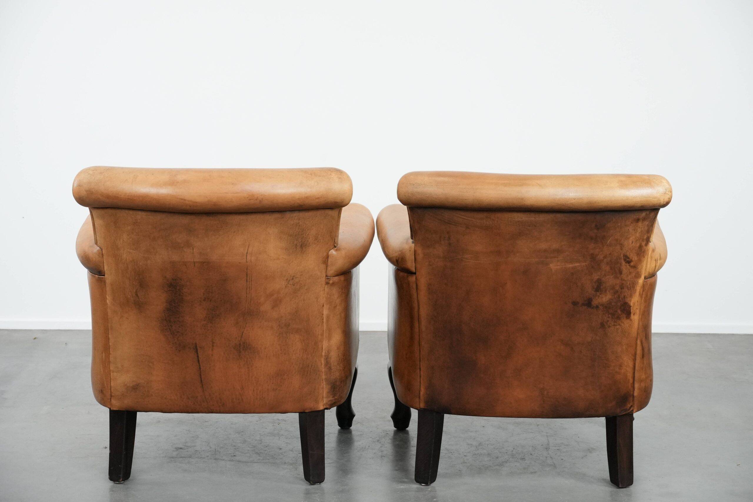 2 fauteuils vintage en cuir de mouton