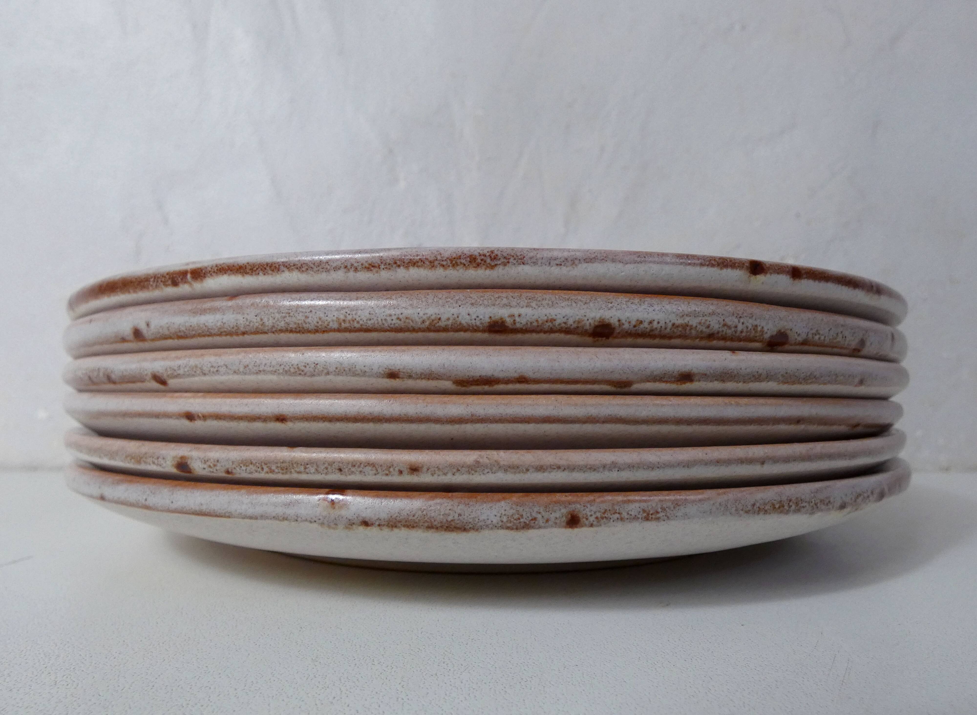 6 signed stoneware dinner plates