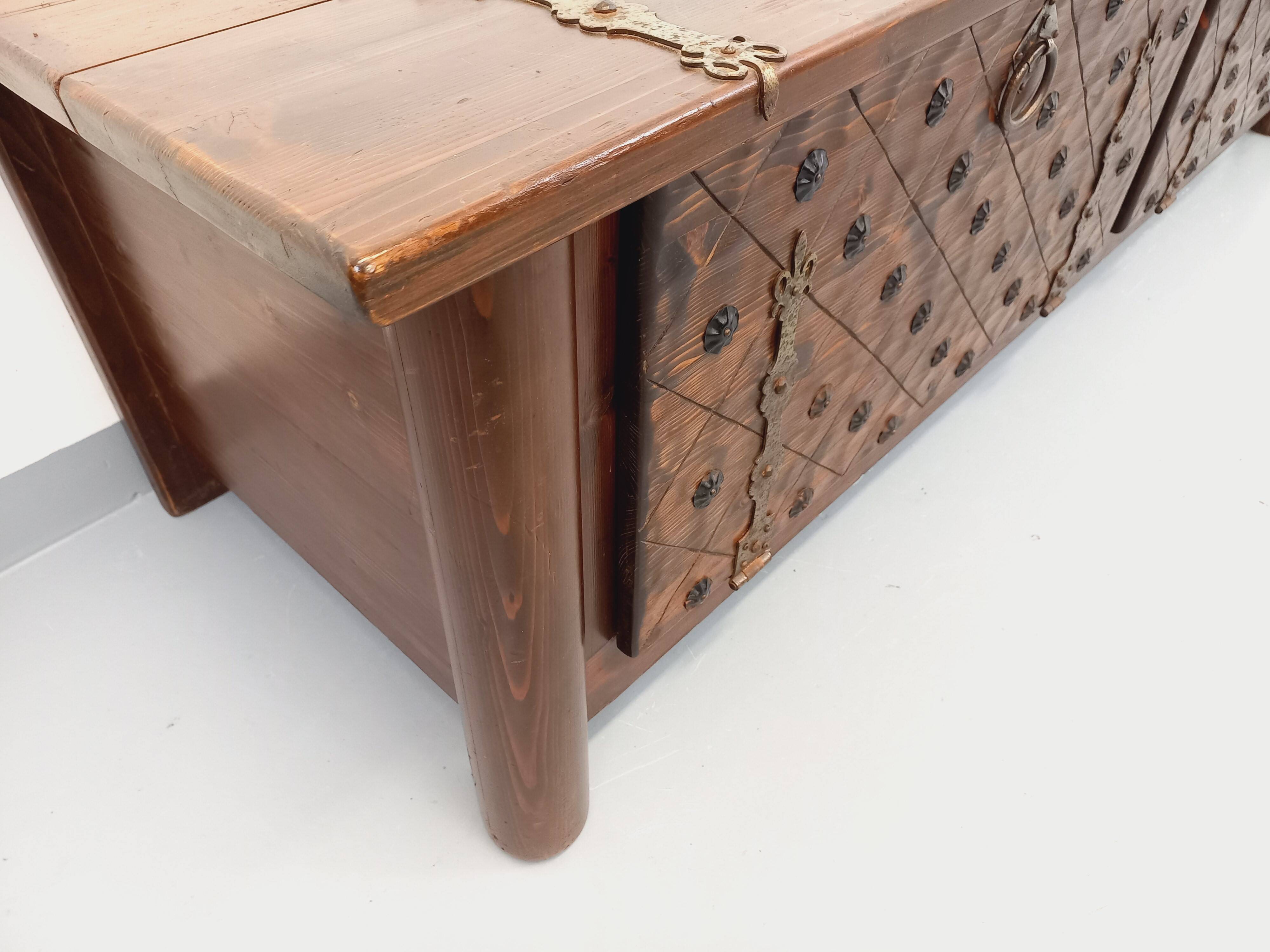 Low brutalist enfilade by Georges Robert in dark pine from the 1960s.