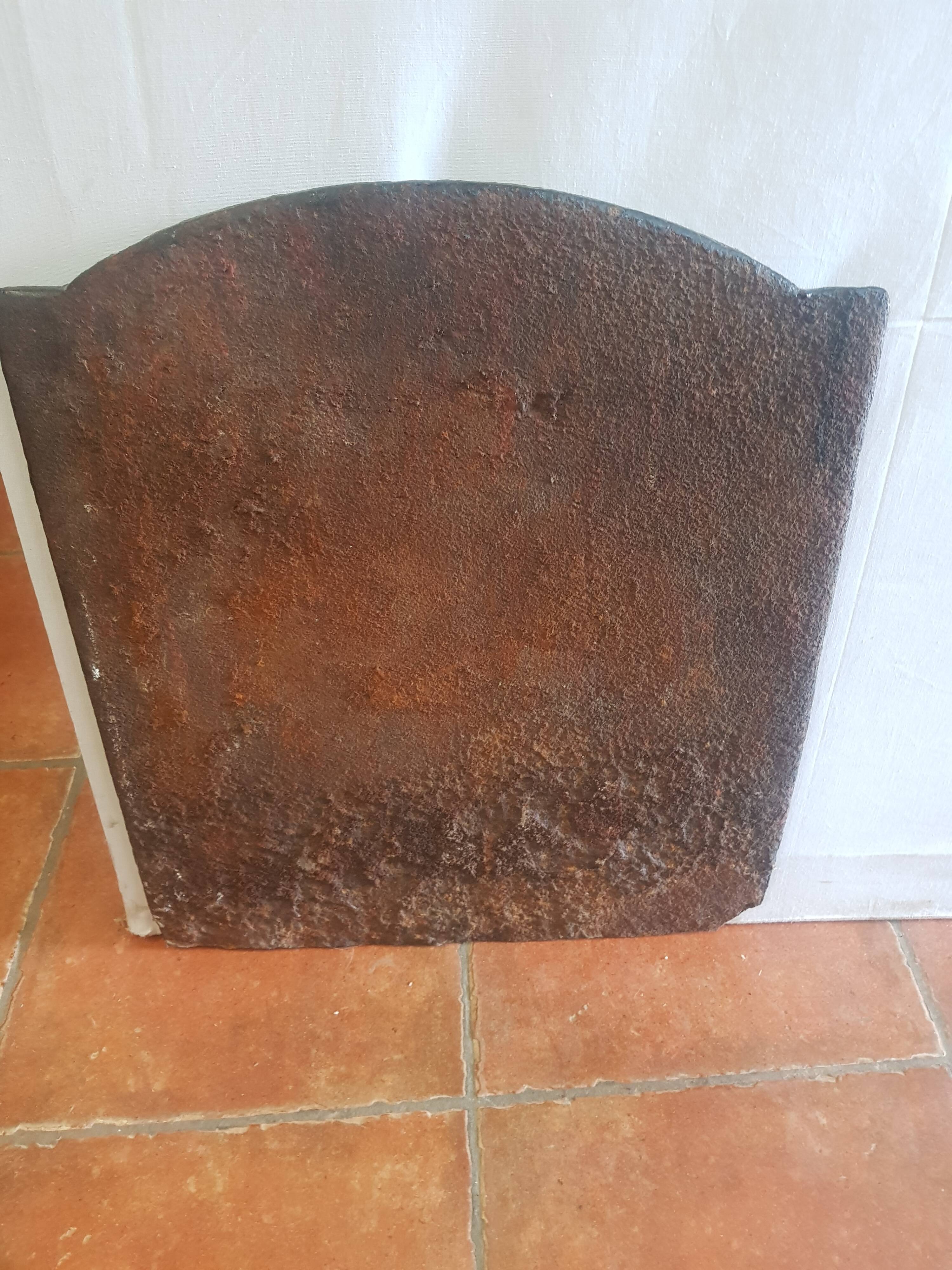 Plaque de cheminée ancienne en fonte