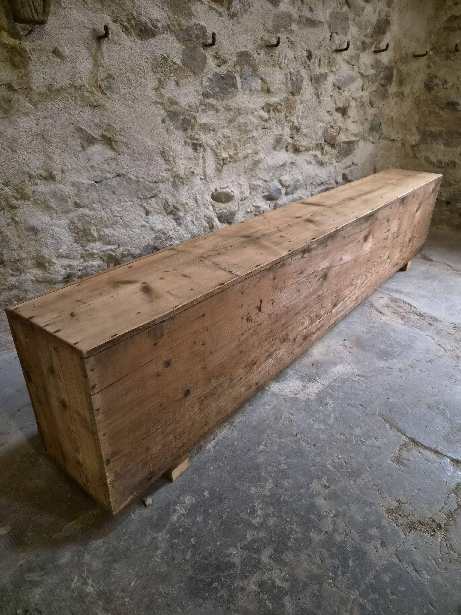 Old French industrial workshop furniture in pine / storage bench, circa 1880–1900