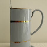 Enamelled metal fountain - light blue and gold