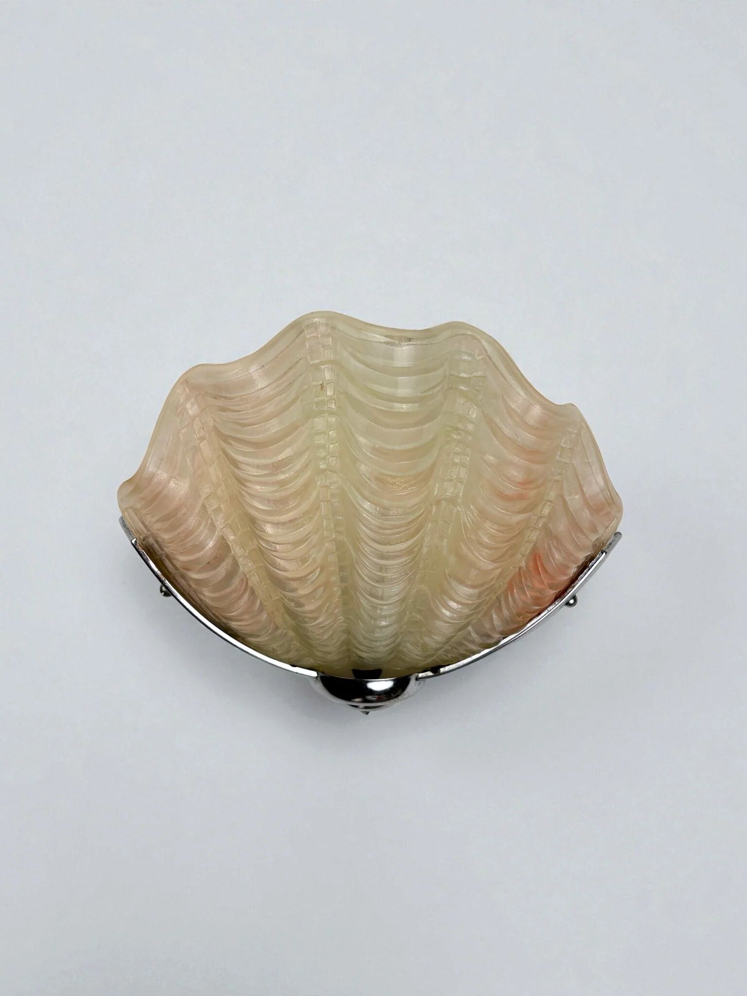 French Art Deco shell wall sconce – amber glass, 1960s