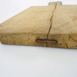 Small and old wooden cutting board. Year 50