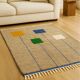 Beige Berber rug, wool, modern square patterns.