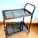 Rattan and smoked glass rolling service