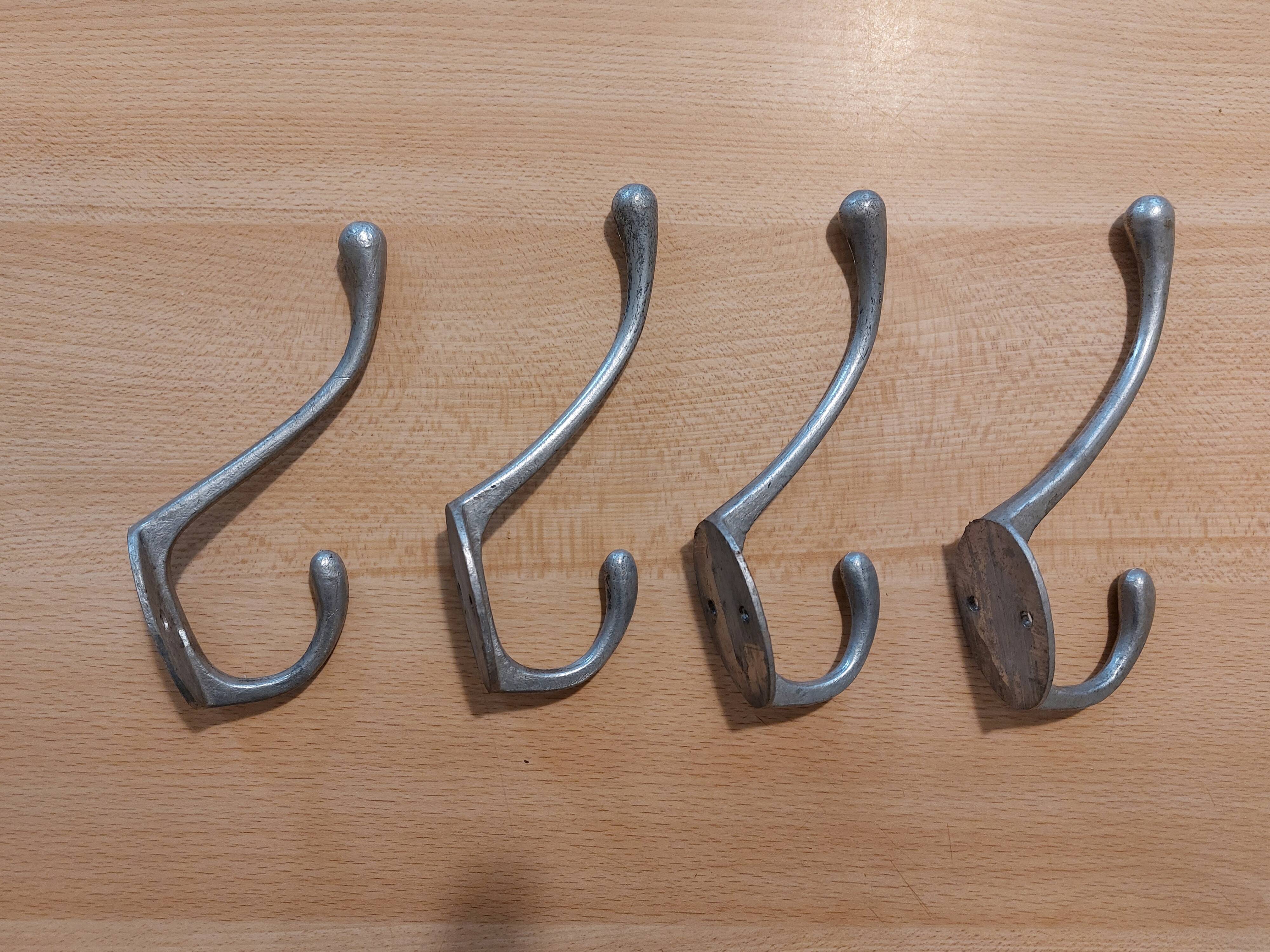 4 old aluminum hooks 30s