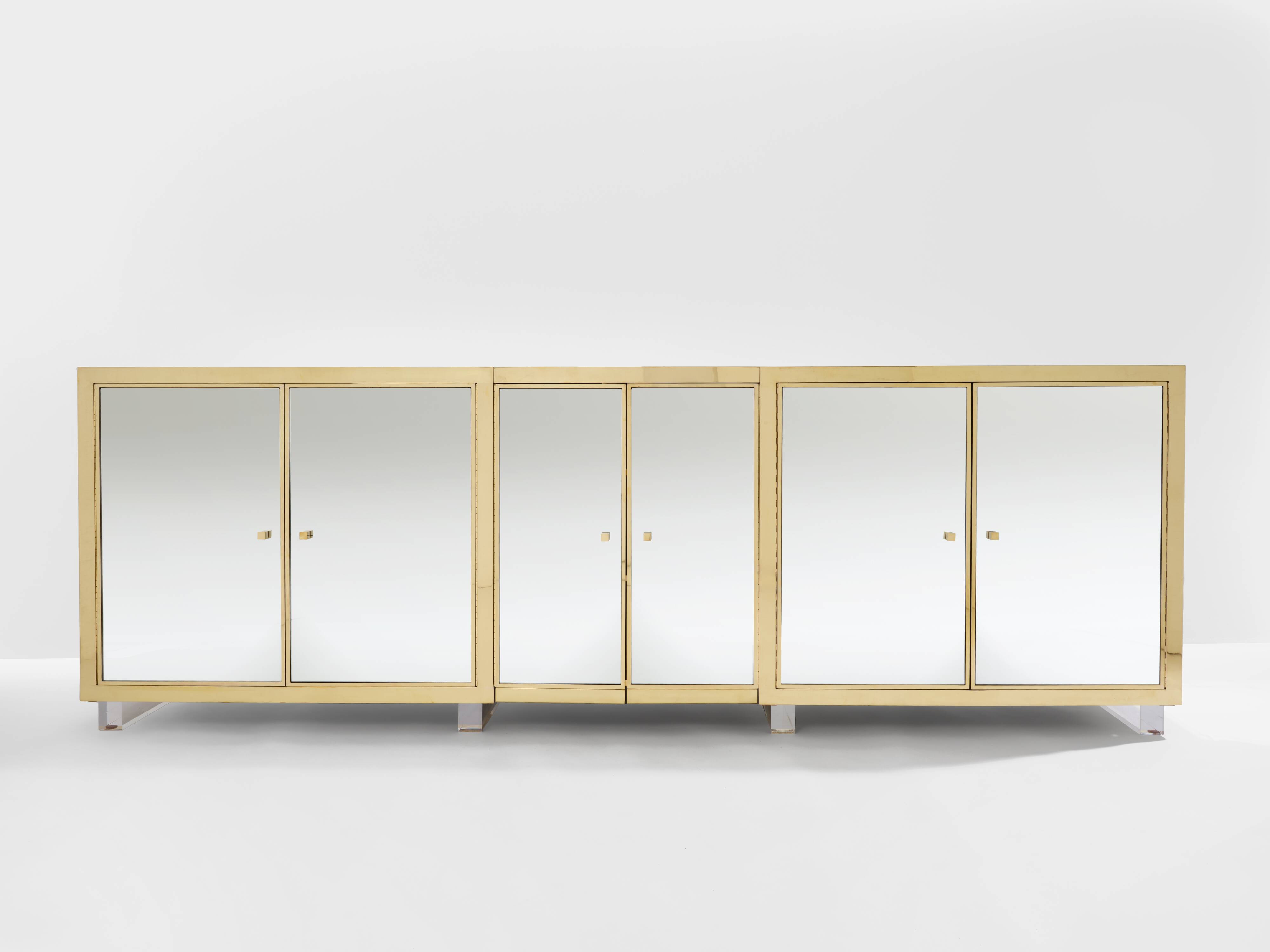 Brass sideboard with mirror and plexiglass legs by Michel Pigneres, 1970