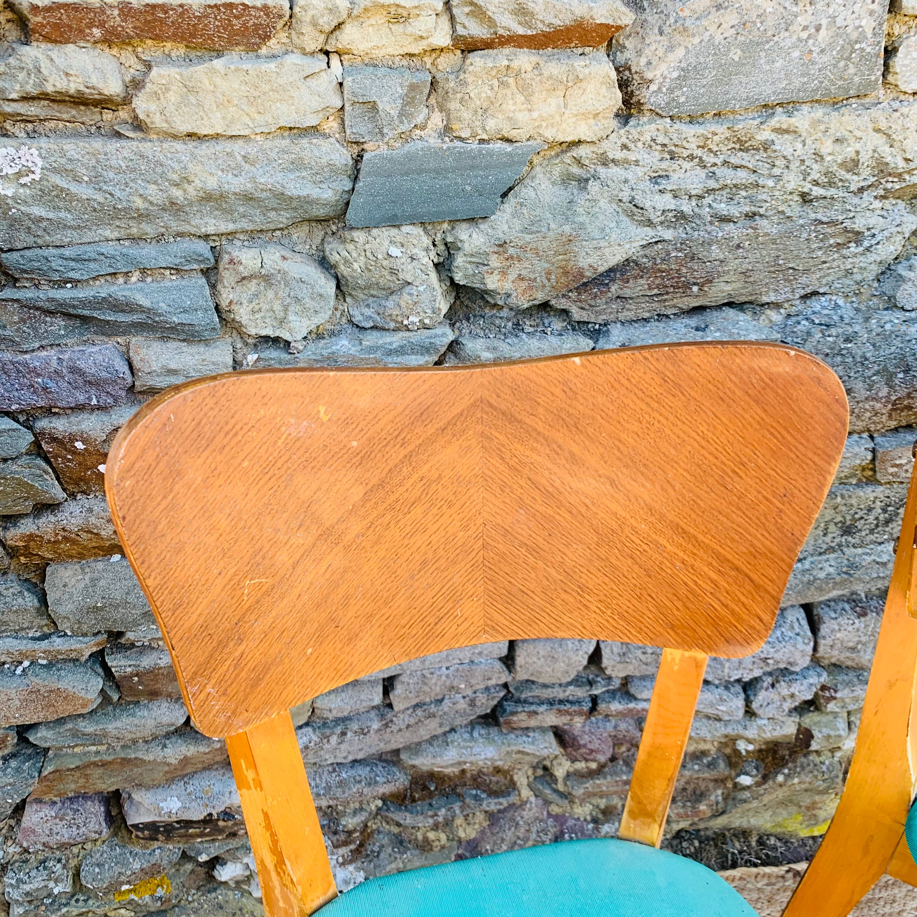 Set of 4 vinyl and wood chairs