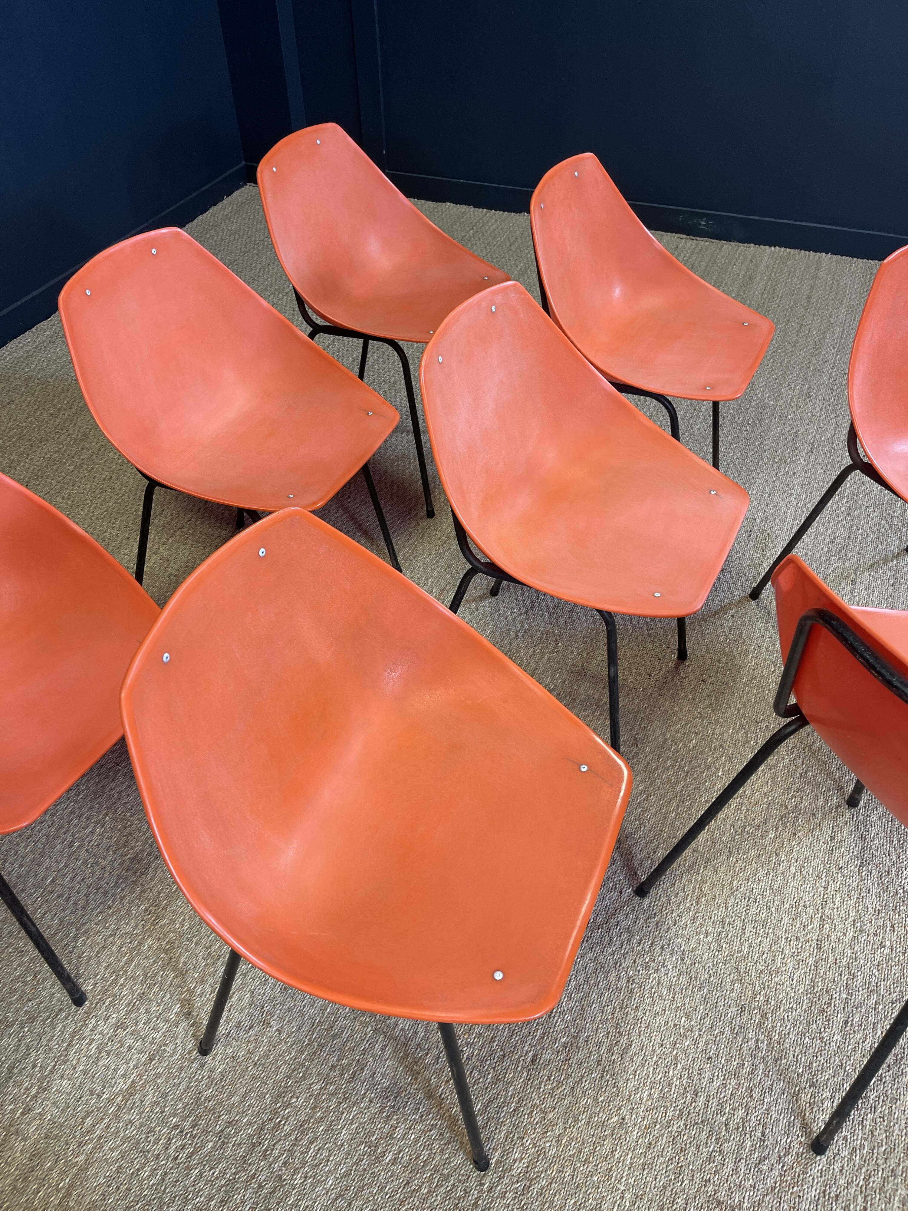 Set of 8 orange Guariche chairs