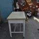 Rustic extendable dining table in white wood with an olive top, 1950s.