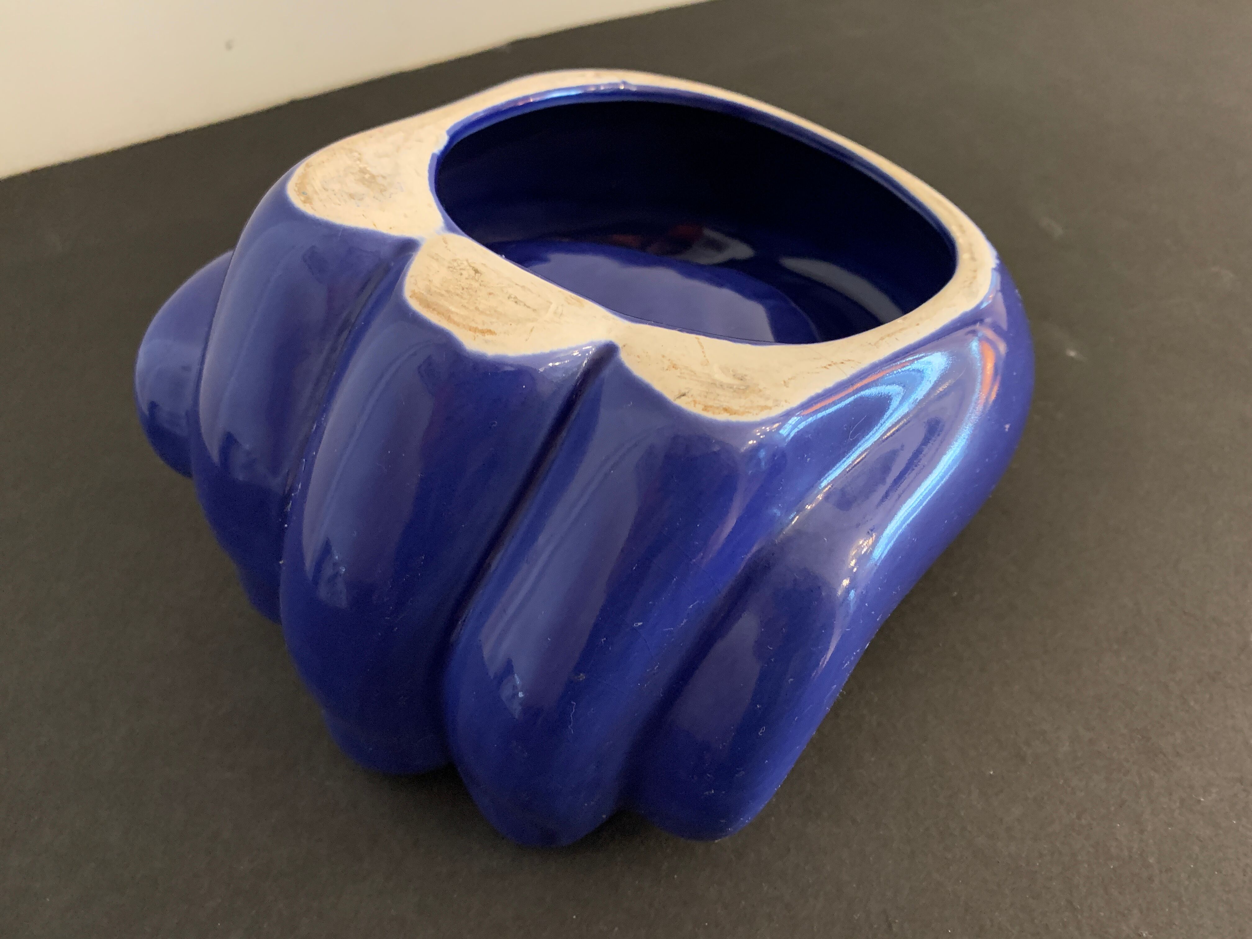 Ceramic ashtray, blue hand shape