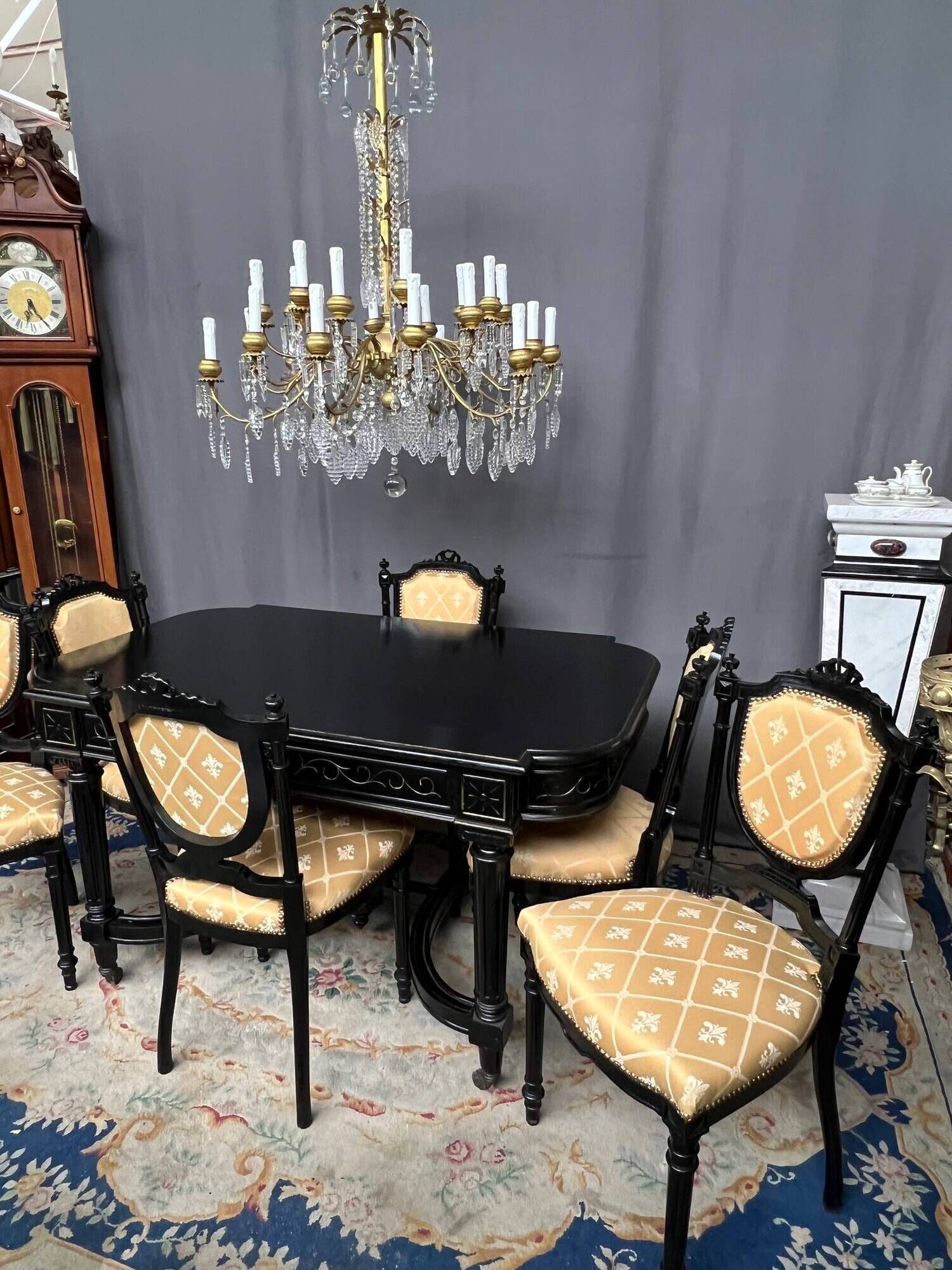Dining room set consisting of a table and six chairs from the Napoleon III period.