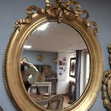 Miroir ovale en bois doré 93x73cm