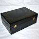 Vintage jewelry box in black leather and red interior