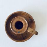 Signed sandstone candle holder