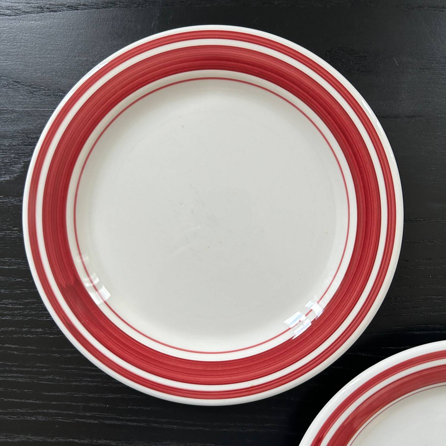 Pair of red striped plates