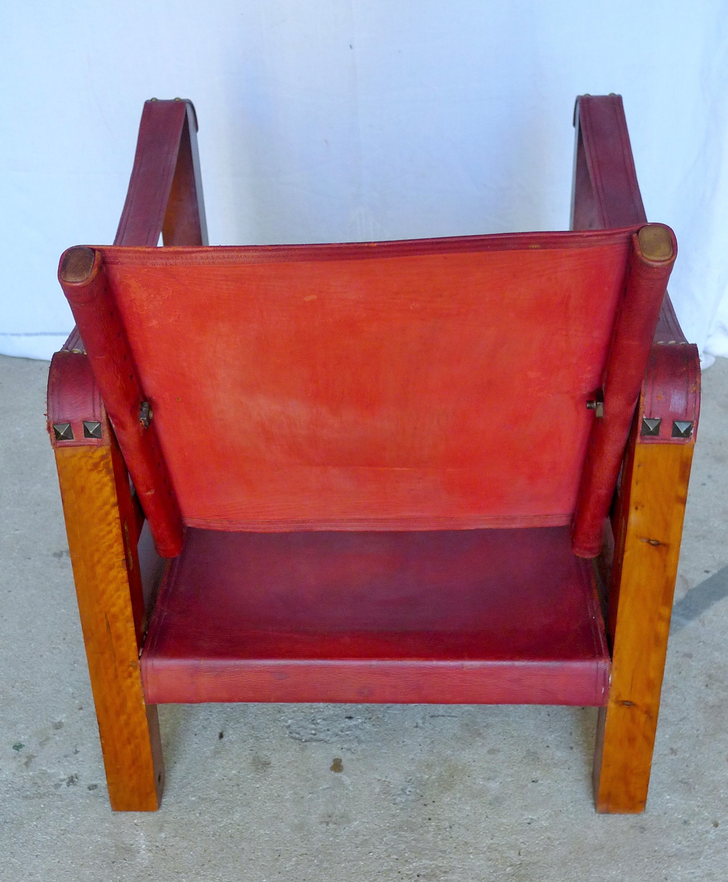 Leather and wood relaxed armchair