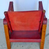 Leather and wood relaxed armchair