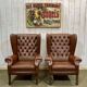Pair of 1970s Chesterfield wingback chairs in brown leather